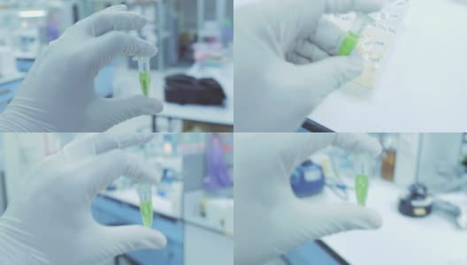 场景POV科学家拿着试管DNA在实验室行走，概念科学与技术，在实验室研究，在实验室工作的科学家高清在线视频素材下载