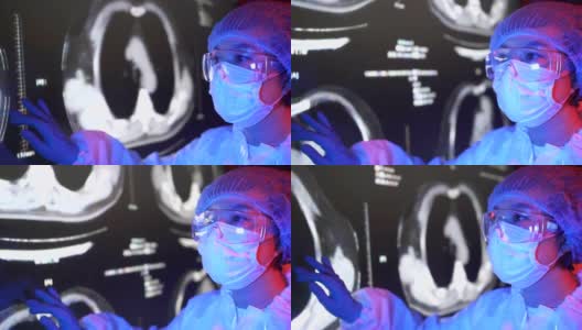 医生在病毒实验室看CT检查图像高清在线视频素材下载