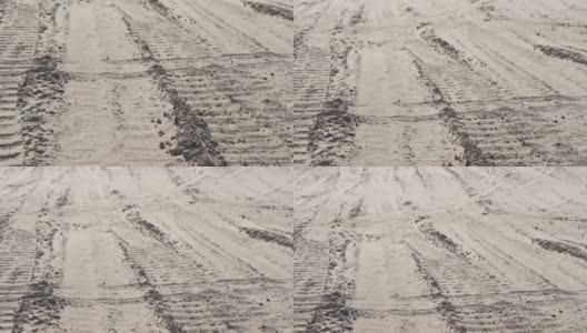 汽车在干土路上的车辙痕迹。特写镜头。干旱高清在线视频素材下载