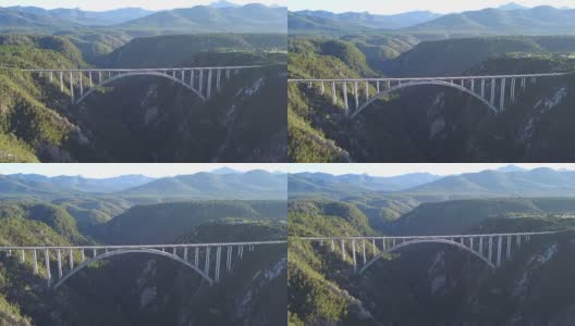 横跨山谷的大桥鸟瞰图高清在线视频素材下载