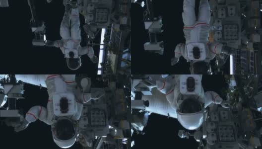 在国际空间站工作的宇航员。现实的4 k的动画。高清在线视频素材下载