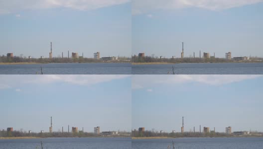 河边的废弃化工厂和烟囱高清在线视频素材下载