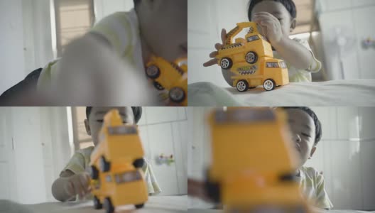 亚洲婴儿玩玩具汽车塑料高清在线视频素材下载