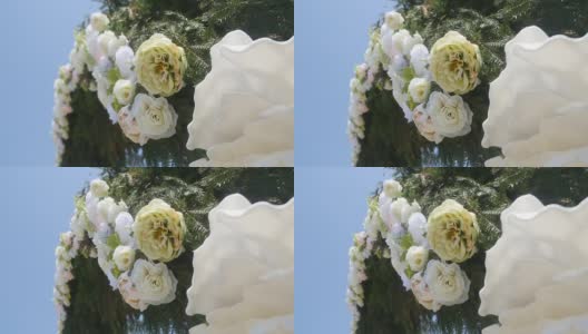婚礼拱门上装饰着鲜花。近距离高清在线视频素材下载