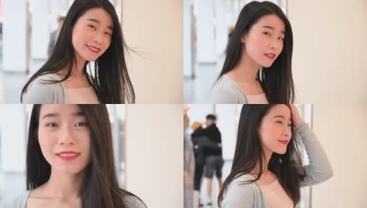 美丽的中国女人对着镜头微笑高清在线视频素材下载