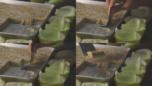 准备泰国南瓜蛋奶沙司，或Sankaya faktong在盘子里准备好了，可以在莲花花瓣上一口大小的块吃高清在线视频素材下载