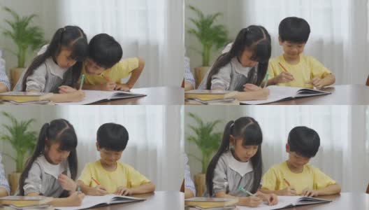 亚洲兄弟姐妹一起画画高清在线视频素材下载