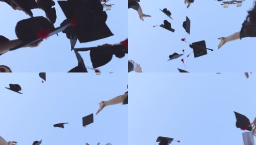 骄傲的学生们把毕业帽抛向空中高清在线视频素材下载