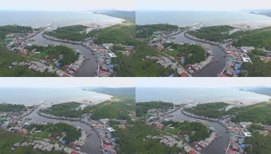 风景优美的海滨村庄，弯曲的河流和海洋背景，航拍视频高清在线视频素材下载