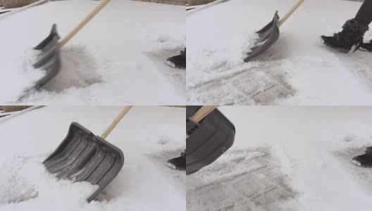 雪铲在积雪覆盖的院子里移动高清在线视频素材下载