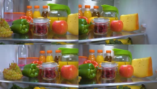 冰箱里的新鲜覆盆子玻璃罐子高清在线视频素材下载