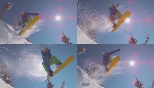 慢镜头特写:激动的滑雪运动员跳过太阳在山的边远高清在线视频素材下载