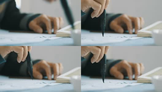 中国毛笔在白纸上画画高清在线视频素材下载