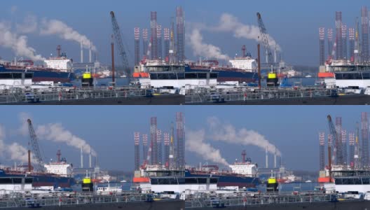 许多活动在鹿特丹港与起重机和石油钻塔高清在线视频素材下载