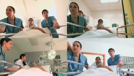 护士们带着氧气面罩开车把病人送到病床上高清在线视频素材下载