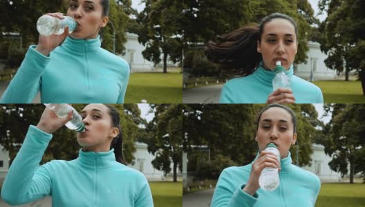 女跑步者喝一瓶水高清在线视频素材下载