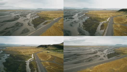 鸟瞰图上的山谷与融化的冰川和山脉。美丽的冰岛自然景观高清在线视频素材下载