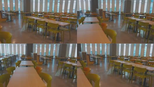 办公大楼里的桌子用智能手机平移拍摄高清在线视频素材下载