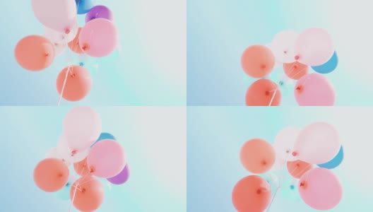 气球在蓝天中色彩斑斓，色彩柔和高清在线视频素材下载