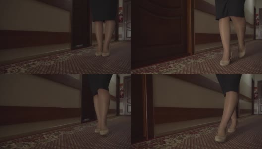 女人的腿在走廊里走高清在线视频素材下载