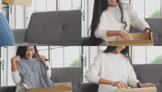 一名亚洲女子在网上购物时收到纸板箱并被送到家中。坐在客厅沙发上打开邮包的女人高清在线视频素材下载