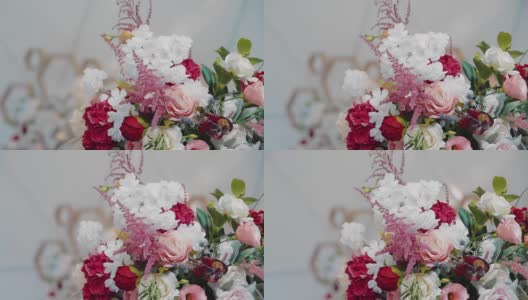 桌上摆着一束鲜花，装饰着宴会厅。特写拍摄一个对象高清在线视频素材下载