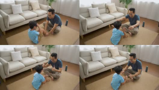 父亲和儿子在愉快地锻炼高清在线视频素材下载