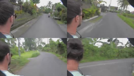 在热带乡村公路上骑摩托车，第一人称视角高清在线视频素材下载