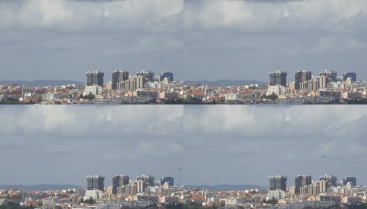 一架双引擎飞机在葡萄牙里斯本市的跑道上着陆。后视图高清在线视频素材下载