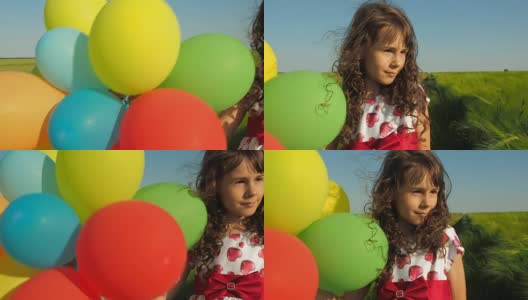 孩子在大自然中与气球高清在线视频素材下载