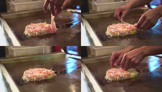 御好烧、日式披萨、煎面粉和熏肉等日本传统美食高清在线视频素材下载