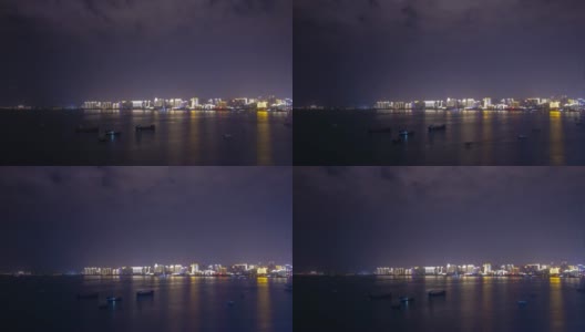 夜晚照亮三亚市湾屋顶全景4k时间推移海南岛中国高清在线视频素材下载