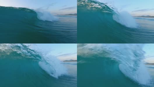 日出时海浪冲上岸来。大西洋的波浪在巴西圣卡塔琳娜岛的海岸冲散高清在线视频素材下载