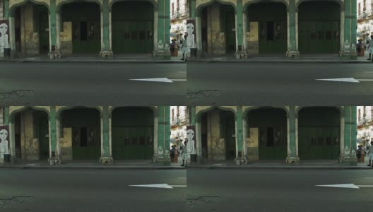 樱桃色的经典美国车在老哈瓦那的街道上高清在线视频素材下载