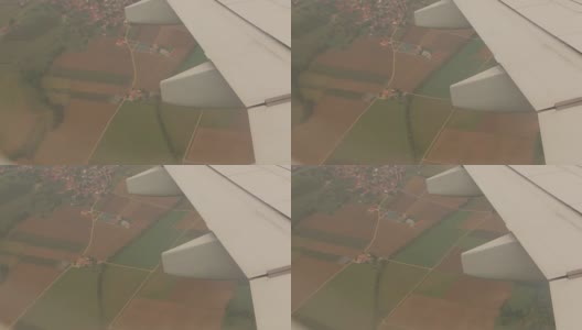 透过飞机窗户的村庄高清在线视频素材下载