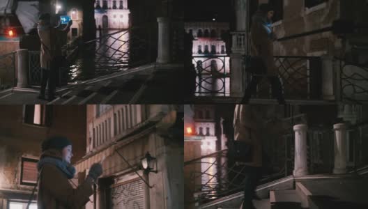 走在威尼斯的夜晚，用垫子拍照高清在线视频素材下载
