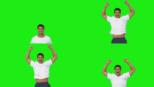 一个在绿色屏幕上举起手臂的兴高采烈的人高清在线视频素材下载