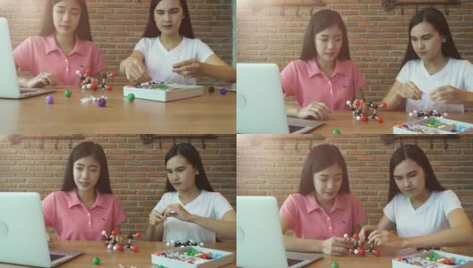 两个女孩在学习化学高清在线视频素材下载