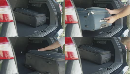 特写:不明男子从他宽敞的汽车后备箱里提旅行袋。高清在线视频素材下载