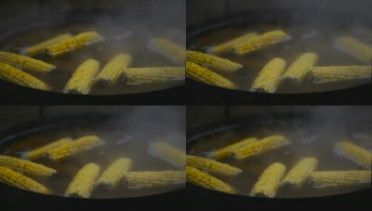 玉米。用平底锅煮的玉米头高清在线视频素材下载