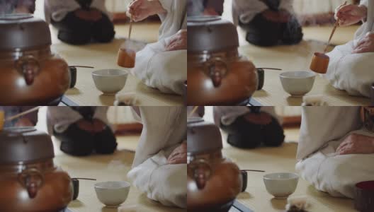 在日本传统茶道中，女主人将热气倒入碗中高清在线视频素材下载