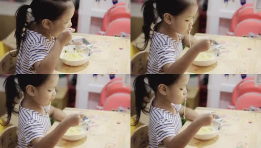 亚洲女孩吃面条高清在线视频素材下载