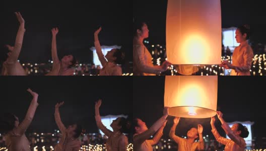 美丽的女人与朋友在Loi Krathong (Yi Peng或Yee Peng)节，泰国清迈。高清在线视频素材下载