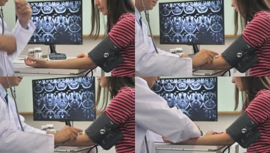 医生在医院给病人检查血压，慢动作高清在线视频素材下载
