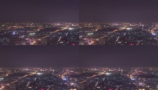 全景鸟瞰图的天际线，建筑物和交通在晚上在广州，时间推移。高清在线视频素材下载