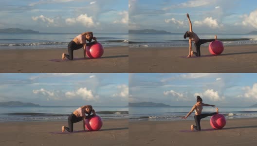 健康的亚洲美女早上在海滩上用球做瑜伽练习。高清在线视频素材下载