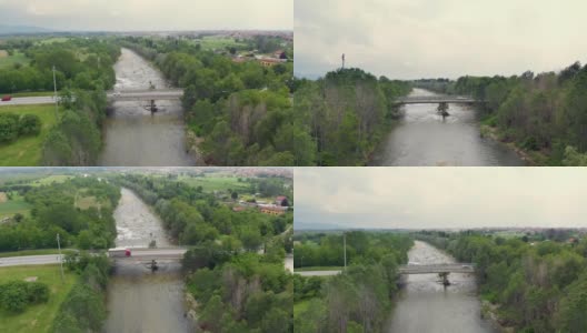 空中:在公路桥上行驶的敞篷汽车高清在线视频素材下载