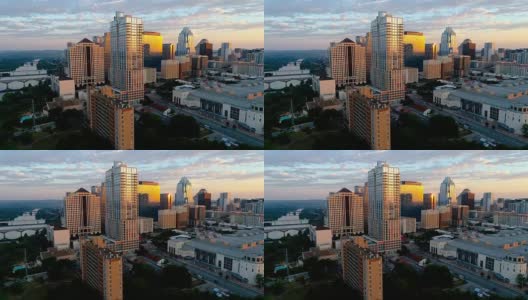 日出从灿烂多彩的显示无人机看市中心天际线城市景观的首都奥斯汀德克萨斯州日出戏剧性多彩的早晨高清在线视频素材下载