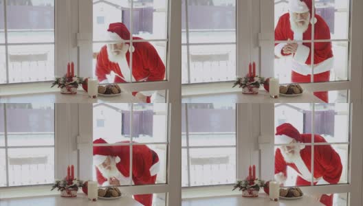 圣诞老人敲窗，想品尝牛奶和饼干高清在线视频素材下载