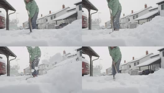 特写:居民们正在清除人行道和前院上的新鲜积雪高清在线视频素材下载